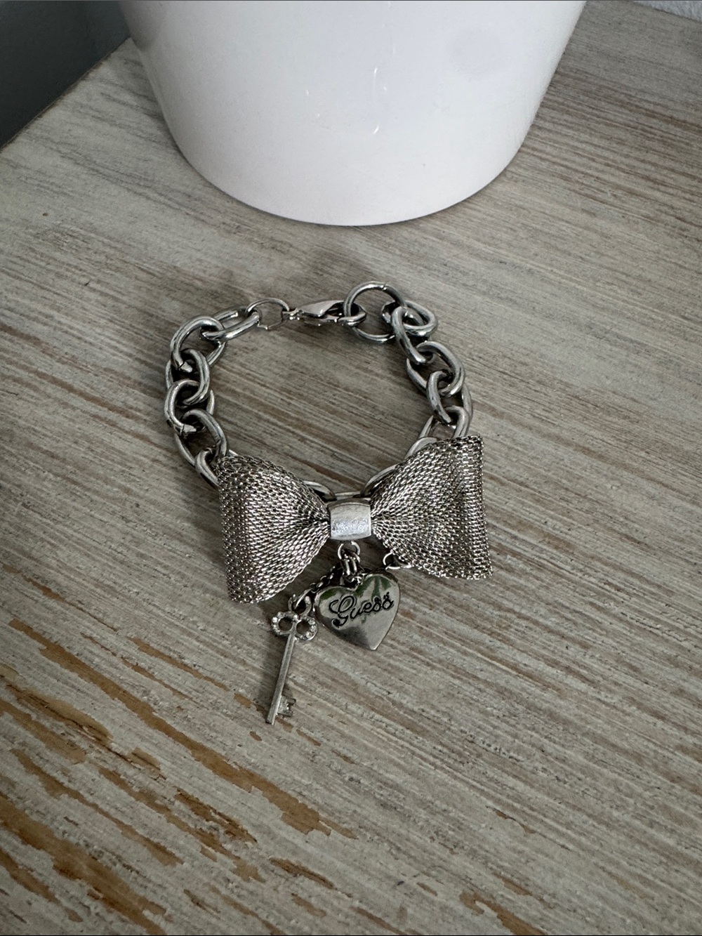 Guess Silver Bow Charm Bracelet with Heart & Key
